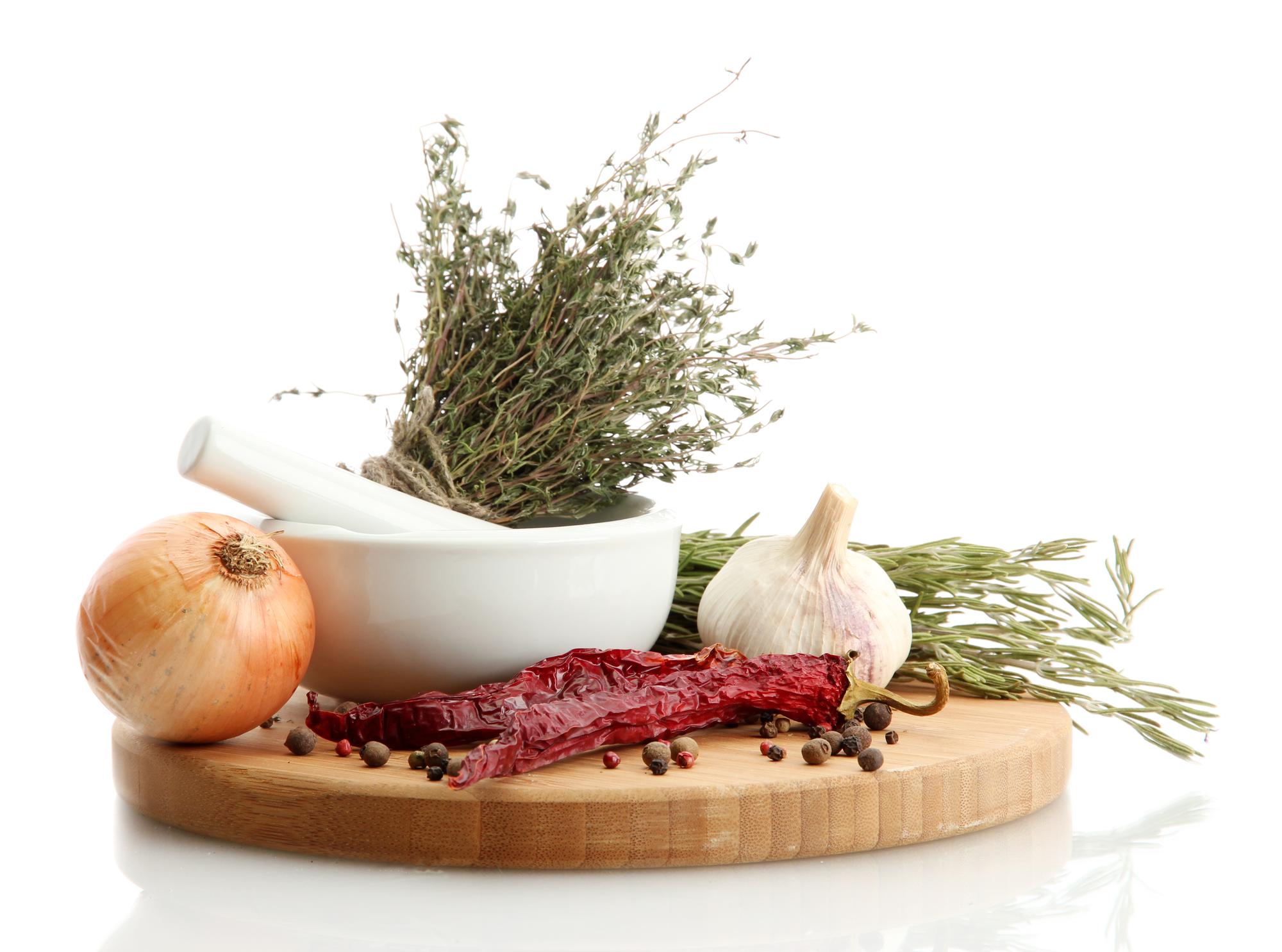 Close up of herbs and spices in bowls